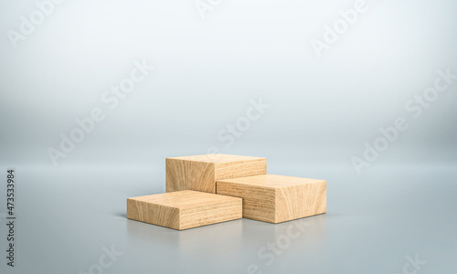 Fototapeta Naklejka Na Ścianę i Meble -  Wooden products display pedestals. Podium made of wood for product exhibition. Minimalist showcase made of wooden blocks. 3D rendering.