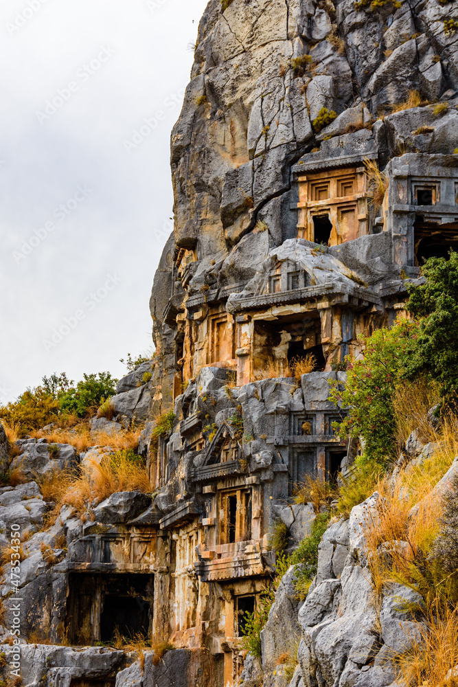 Ruins of the ancient lycian rock tombs in town Demre. Ancient Myra city. Antalya province, Turkey