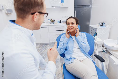 Woman having conversation with doctor