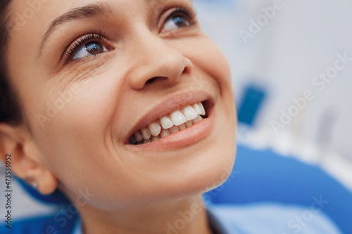 Happy woman preparing for dental treatment