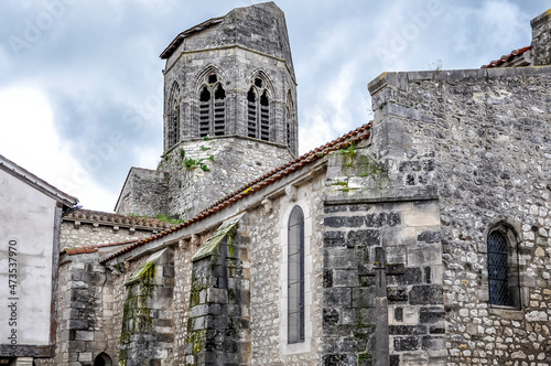 Charroux, France.
View of the Church of Saint-Jean-Baptiste in the village of Charroux, a medieval town, and classified as one of the most beautiful villages in France
 photo