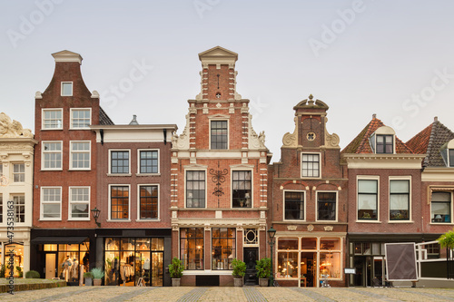 The Dutch shopping street Mient in the historic city center of Alkmaar, The Netherlands