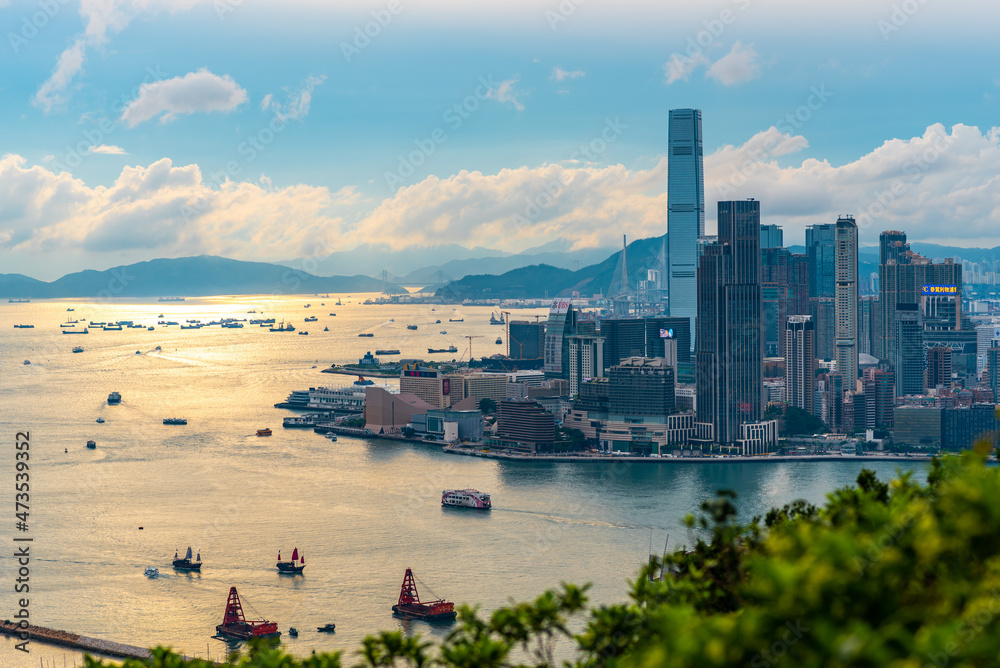 Hong Kong harbor with landscape view of city skyscraper skyline building, China business landmark