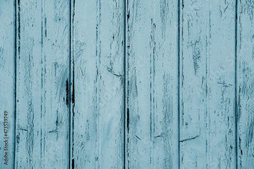 close-up of petrol, turquoise planks of construction with old paint, natural wood texture, narrow boards, horizontal, wallpaper, building material, background for designer with copy space