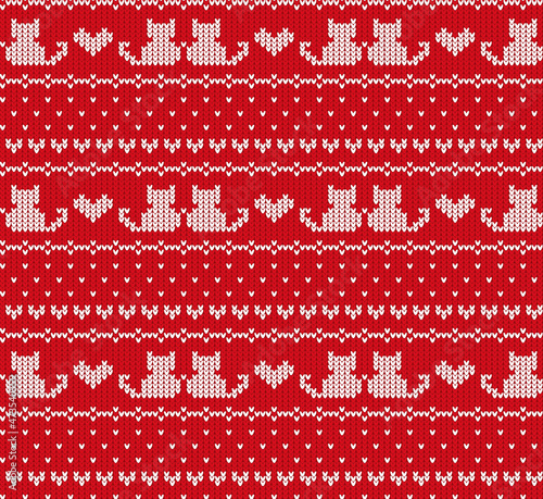Knitted vector pattern with cats and hearts on a red background