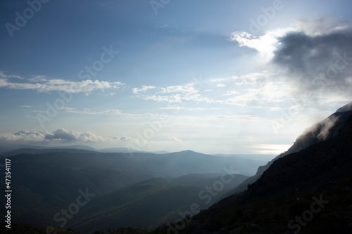 cloudy blue sky foggy mountain landscape