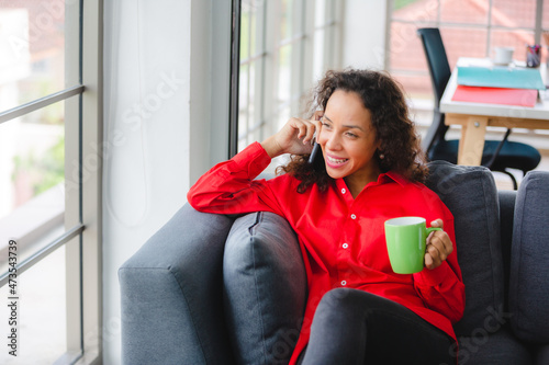 African American woman drin...