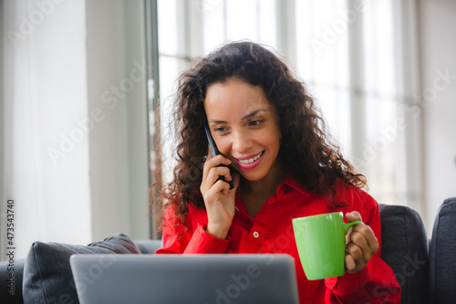 African American woman drin...
