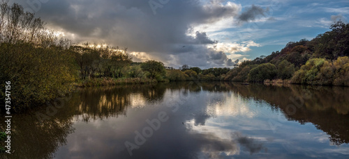 Panoramic view of Lake in Kenwith valley local nature reserve aka LNR, and community park. Photo taken November in Bideford, Devon. photo