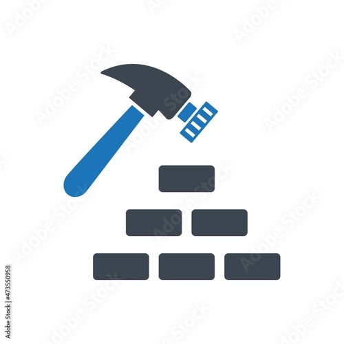 Hammer and bricks icon