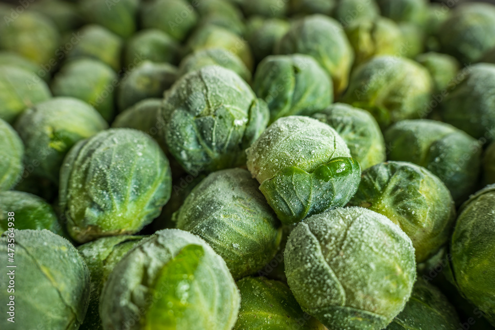 frozen brussels sprouts background closeup frozen brussels sprouts background closeup