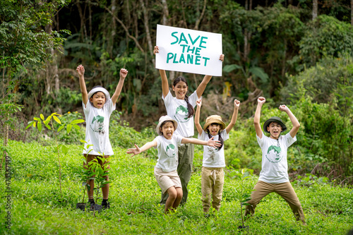 Children join as volunteers for reforestation, earth conservation activities to instill in children a sense of patience and sacrifice, doing good deeds and loving nature. photo