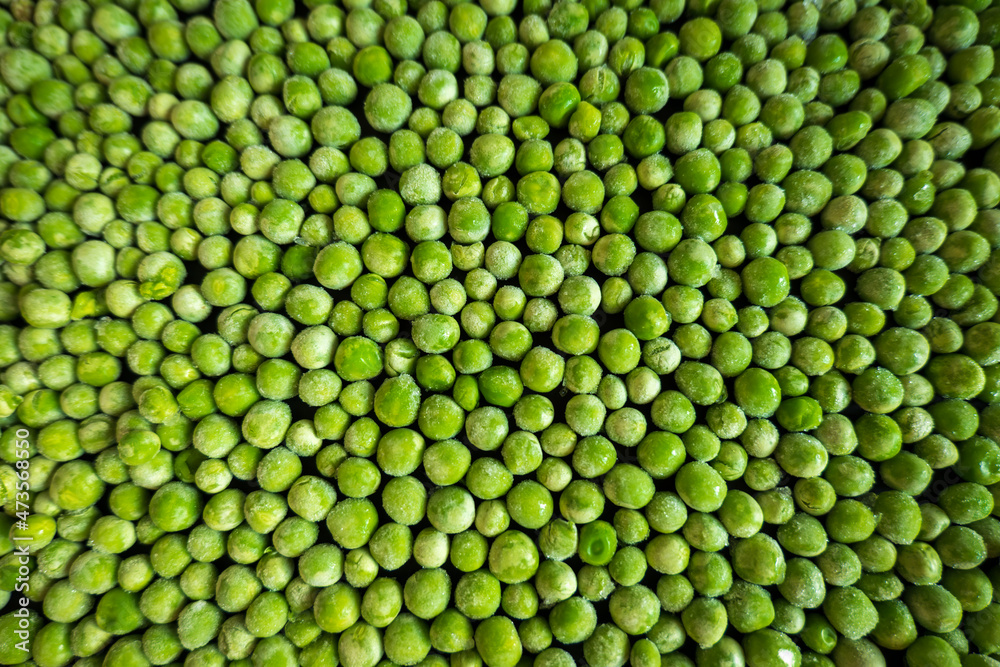 frozen frosty green peas background closeup frozen frosty green peas background closeup