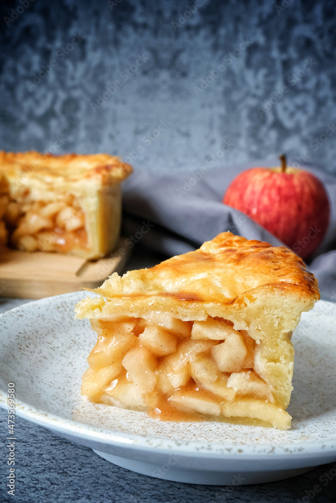 Apple pie on wood board with fresh apple Apple pie on wood board with fresh apple