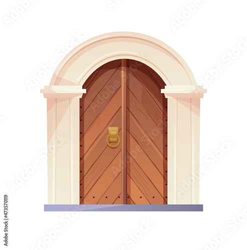 Antique medieval wooden door with metal round handle and arch. Entrance, gate in a castle, church or house.