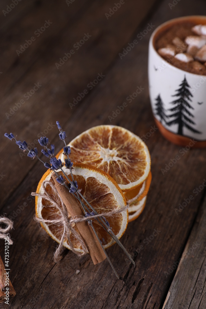 Fototapeta premium Cocoa with marshmallows, cinnamon and dried oranges