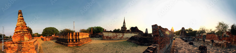 Panoramic view of Wat Mahathat (temple) ruins during sunset at Ayutthaya, Thailand