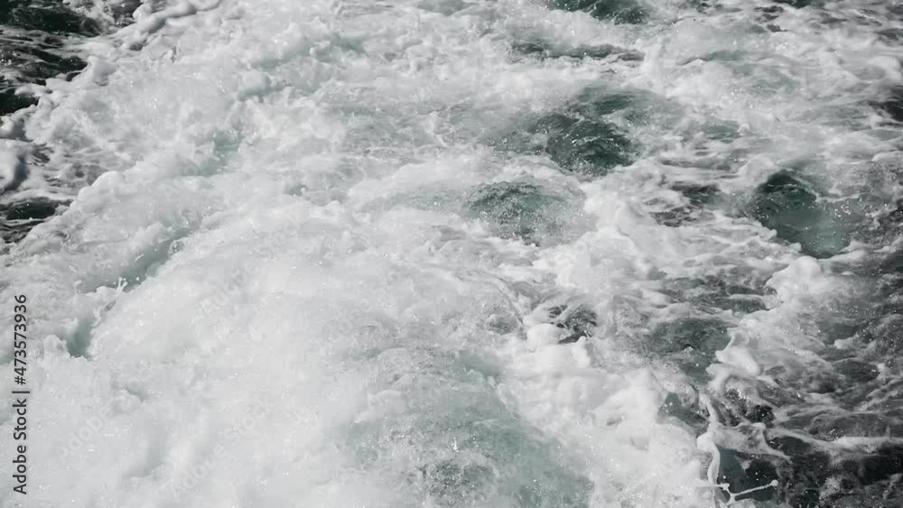 Aerial top down view from high altitude of blue turquoise sea water texture. a view of the water surface. Background of the water surface. Aerial top down view from high altitude of blue turquoise sea water texture. a view of the water surface. Background of the water surface.