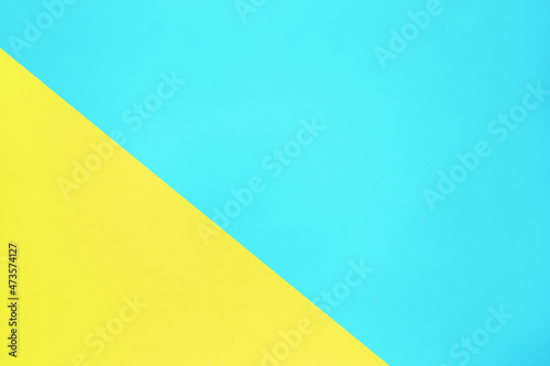 Free Download blue and yellow pastel color paper texture top view minimal flat lay background - GFXLoad