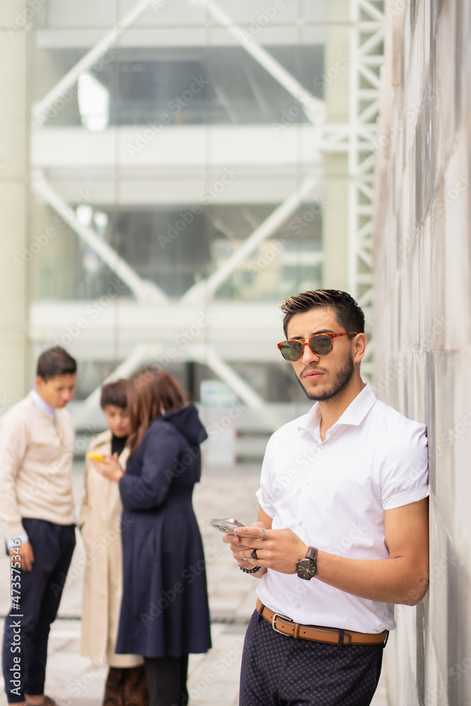 Young man with his female colleagues in the foreground. Young man with his female colleagues in the foreground.