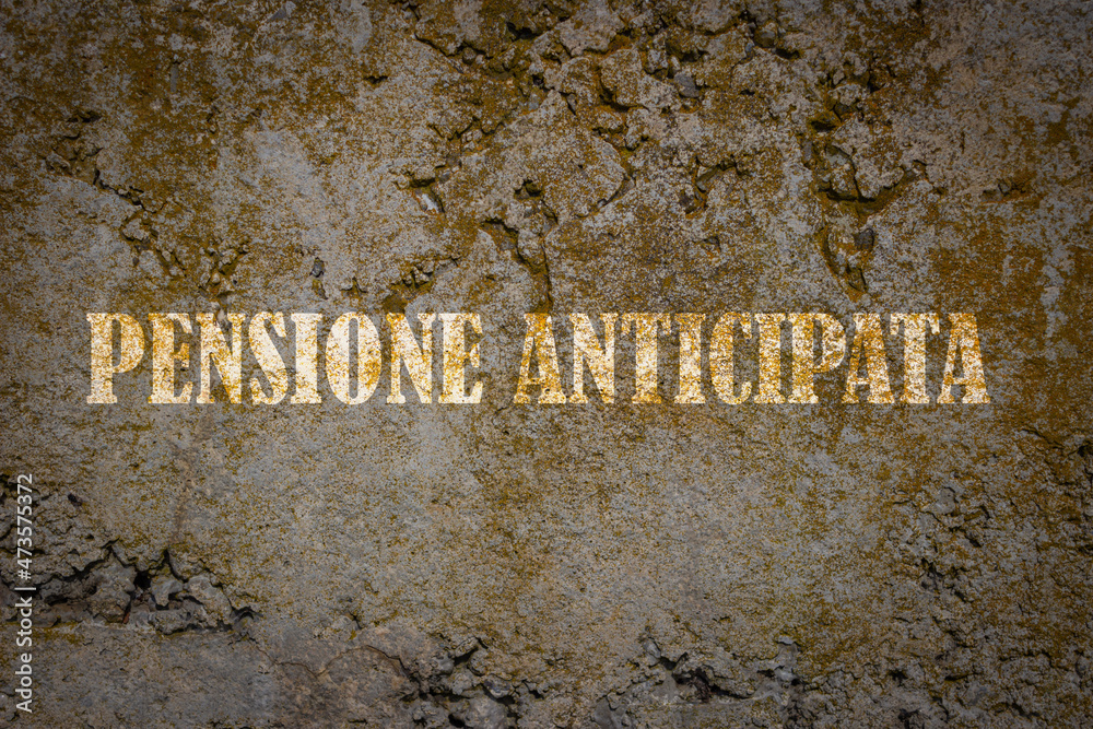 An old concrete wall with the superimposed writing in Italian: EARLY PENSION. Retire earlier than expected age.