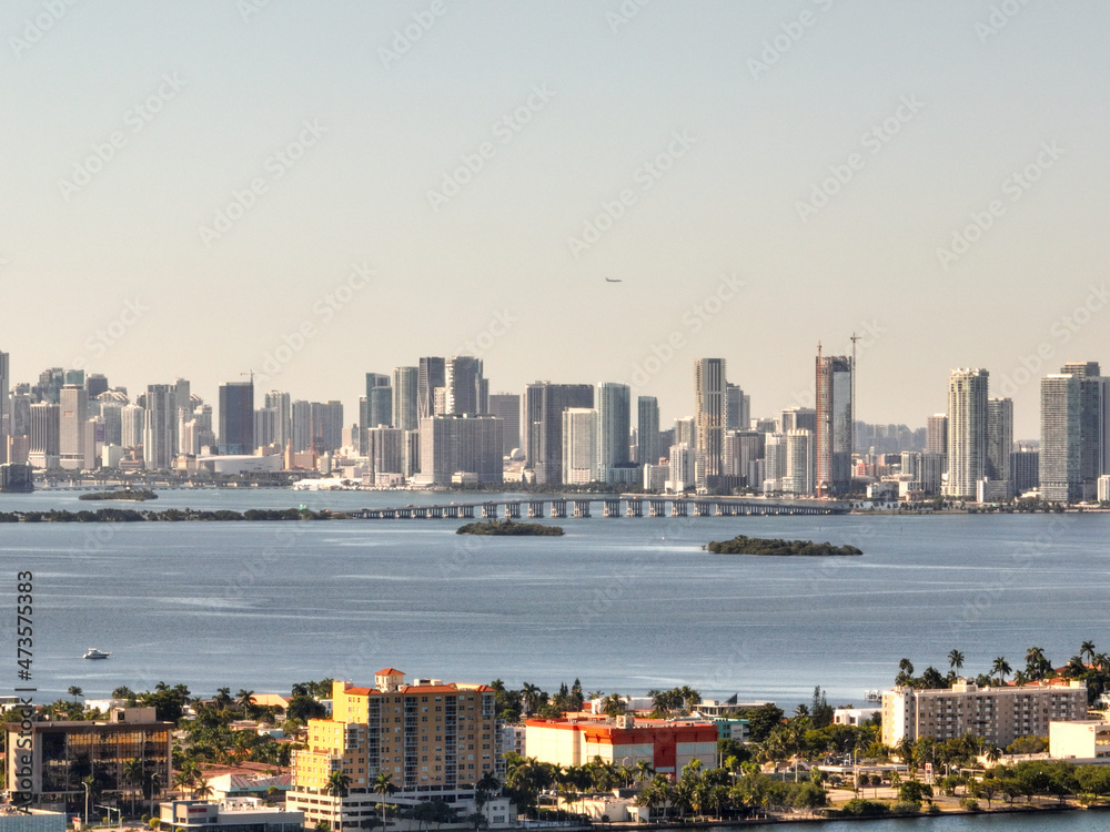 drone capture of downtown miami skyline from an island