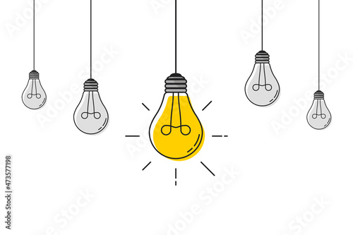 Hanging light bulbs with one glowing. Electric extinct lightbulbs set and one glowing. Concept of idea and choosing successful idea from many failed ones. Flat style. Vector illustration. photo