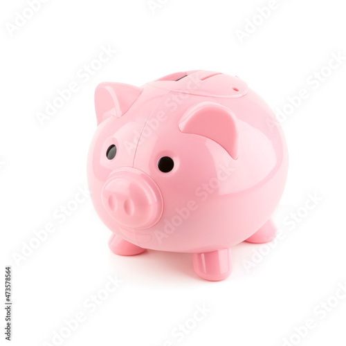 Piggy bank in traditional pink color.