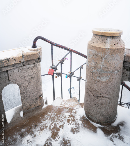 Stairs covered with snow in winter
