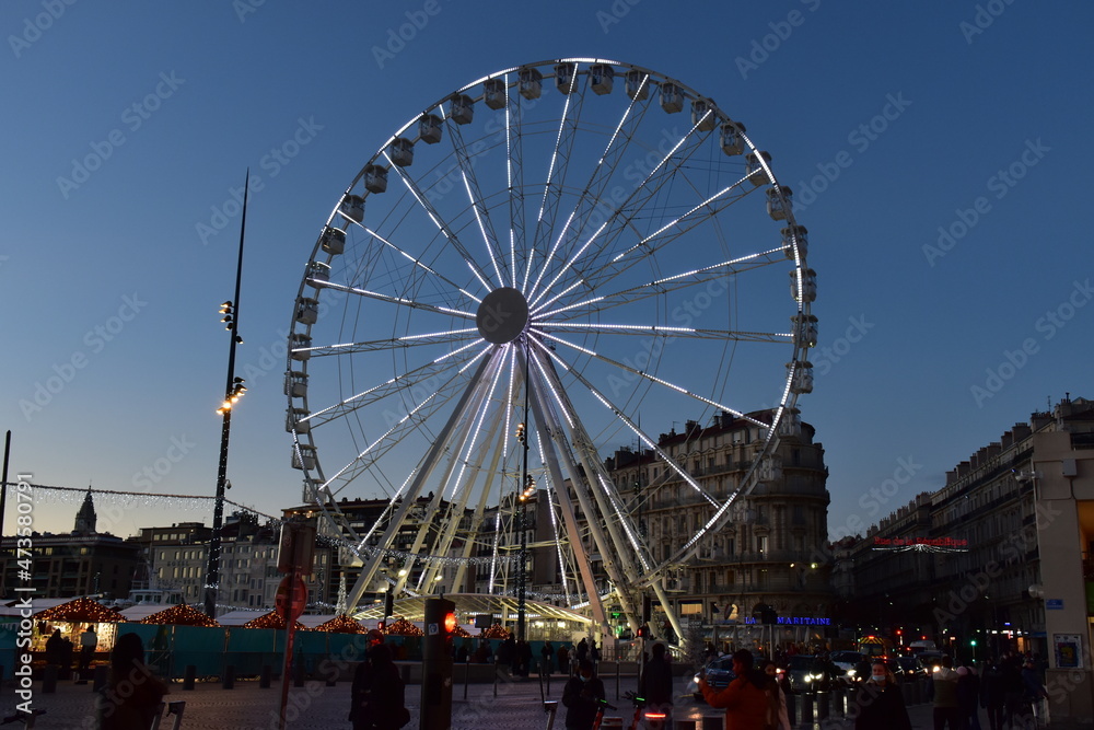 Ferris wheel installed in France in Marseille at the Vieux Port for the christmas festive season. The wheel is located behind the Christmas Market.
