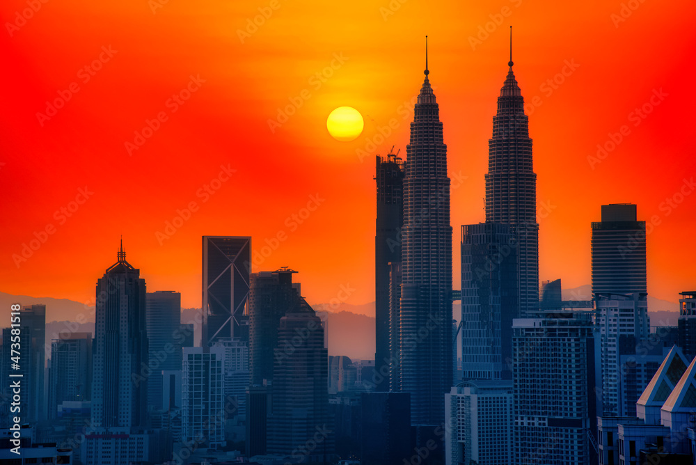 Silhouette Cityscape of Kuala lumpur city skyline at sunrise in Malaysia.