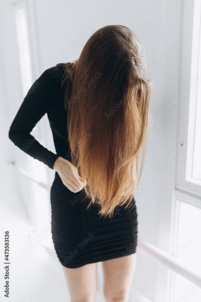 Close up young beauty caucasian woman in black dress Close up young beauty caucasian woman in black dress