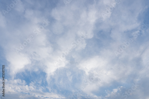 Fototapeta Naklejka Na Ścianę i Meble -  Soft-Focused Clouds on a Blue Sky Background for a Delightful View
