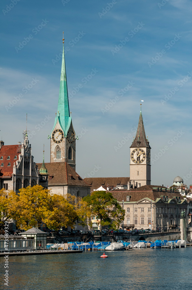 Zurich, Switzerland on October 20, 2012. Fraumunster Tower and St. Peter's Church, whose clock is the largest in Europe.