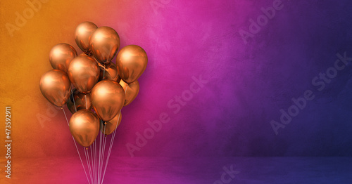 Copper balloons bunch on a rainbow wall background. Horizontal banner.