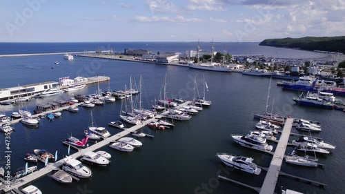 Gdynia city by the sea on a sunny day from a drone. Summer colors and sun rays in Gdynia.