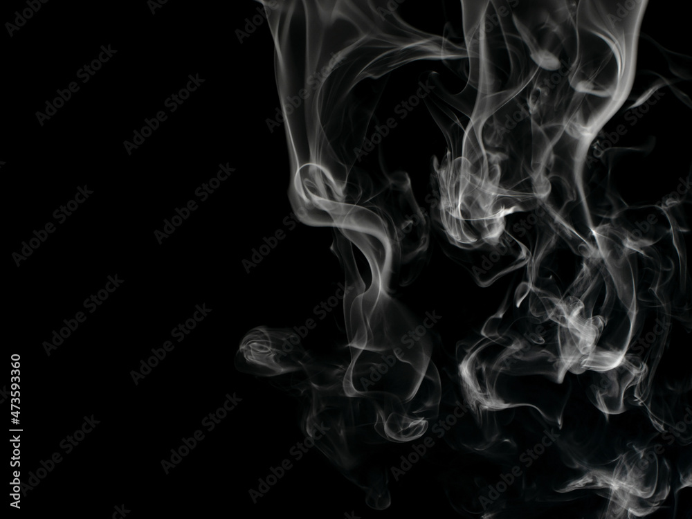 Chaotic mixing smoke creates abstract patterns on a black background Chaotic mixing smoke creates abstract patterns on a black background