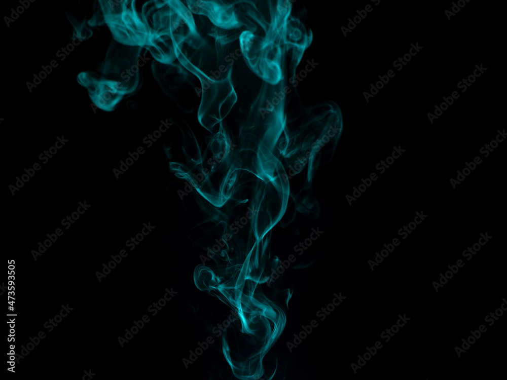 Chaotic mixing smoke creates abstract patterns on a black background Chaotic mixing smoke creates abstract patterns on a black background