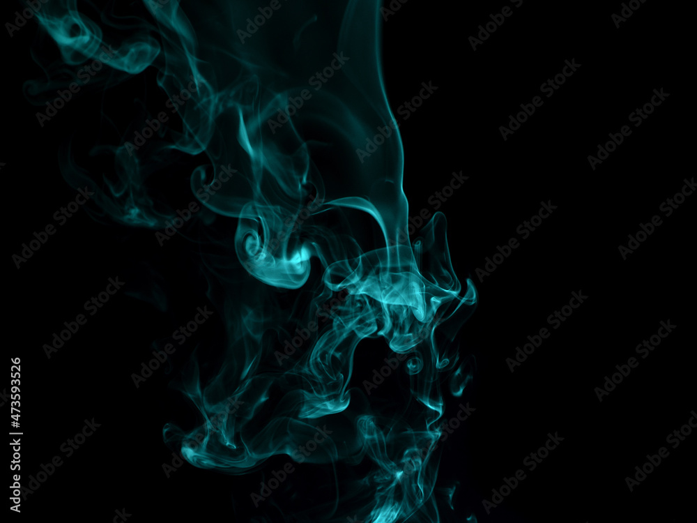 Chaotic mixing smoke creates abstract patterns on a black background Chaotic mixing smoke creates abstract patterns on a black background