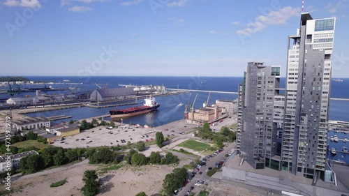 Gdynia city by the sea on a sunny day from a drone. Summer colors and sun rays in Gdynia.