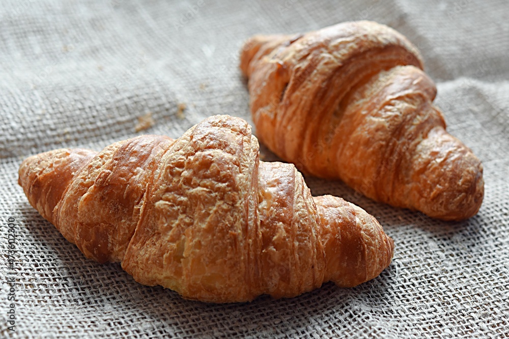 croissants on a canvas napkin. breakfast croissants on a canvas napkin. breakfast