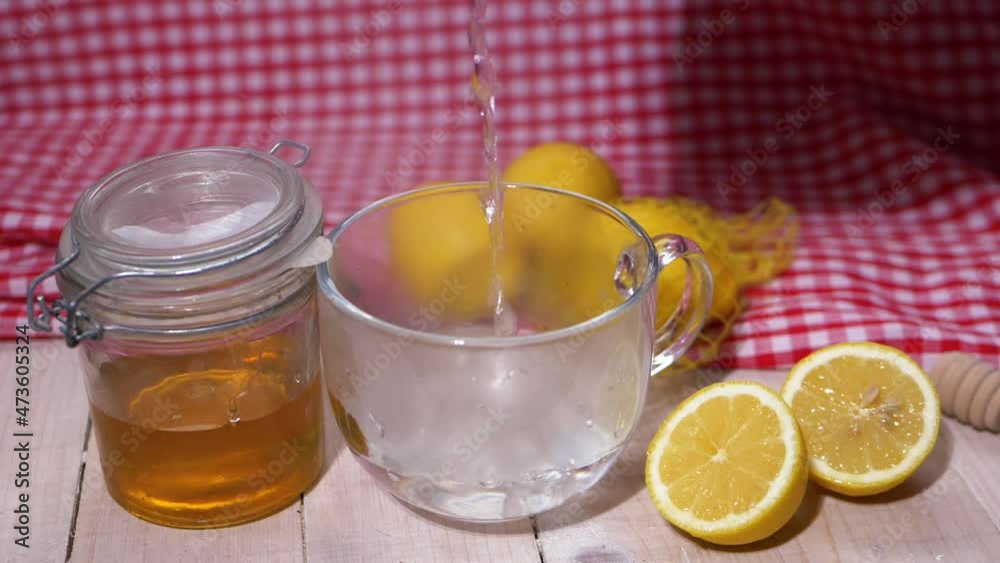 Pouring hot water for homemade sickness remedy Pouring hot water for homemade sickness remedy