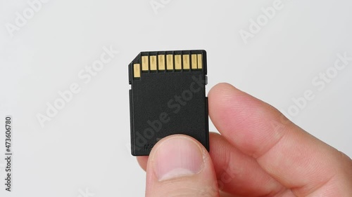 clips video 4k and full HD of memory SD card isolated on clean background this sd card for various computer, digital camera and smart mobile phone devices.