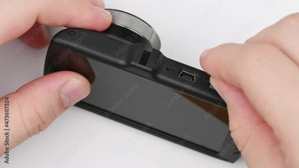 camcorder dashboard security car camera or dashcam with hand holding isolated on white background.
camcorder dashboard security car camera or dashcam with hand holding isolated on white background.