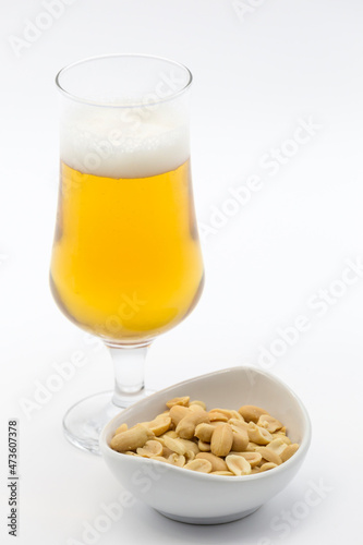 bowl of cocoa and glass of beer on white background