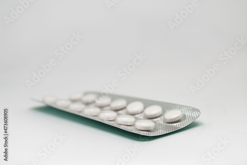 Pack of pills on white background