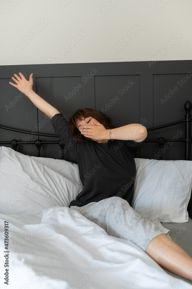 Woman woke up in the bed Woman woke up in the bed