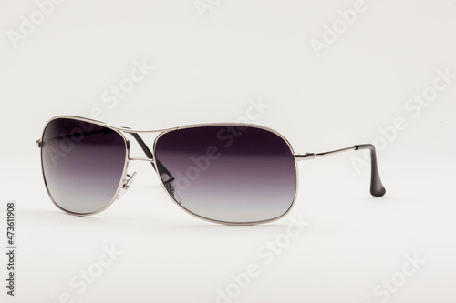 Side angle studio shot of aviator sunglasses 