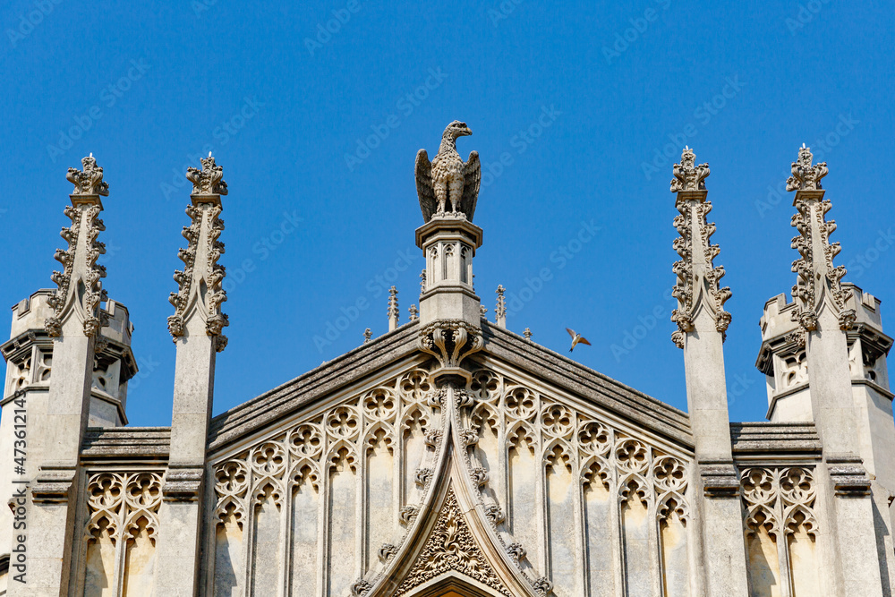 Fototapeta premium St John's College New Court and blank clock tower face, sunny day