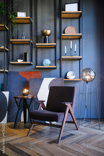Interior with dark chair and shelves